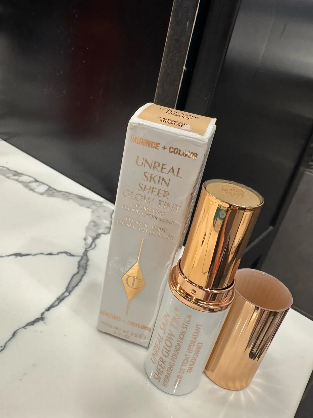 Charlotte Tilbury Unreal Skin Sheer Glow Tint Hydrating Foundation Stick – 5 Med